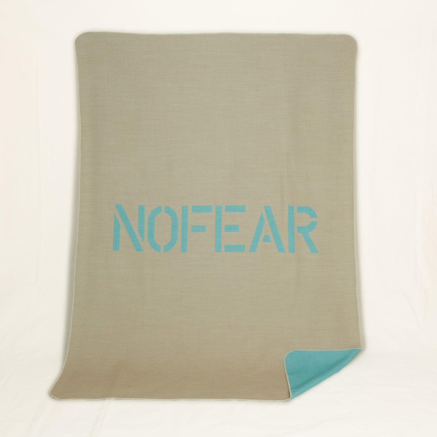 Wolldecke / Throw: NOFEAR Türkis/Sand